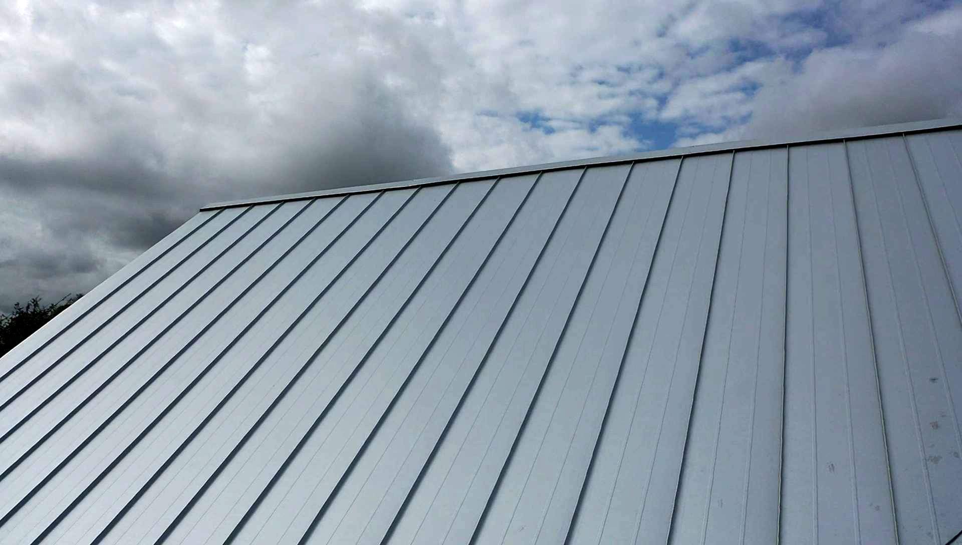 Residential Metal Roof Installation using McElroy Metal by Premier Roofing and Contracting