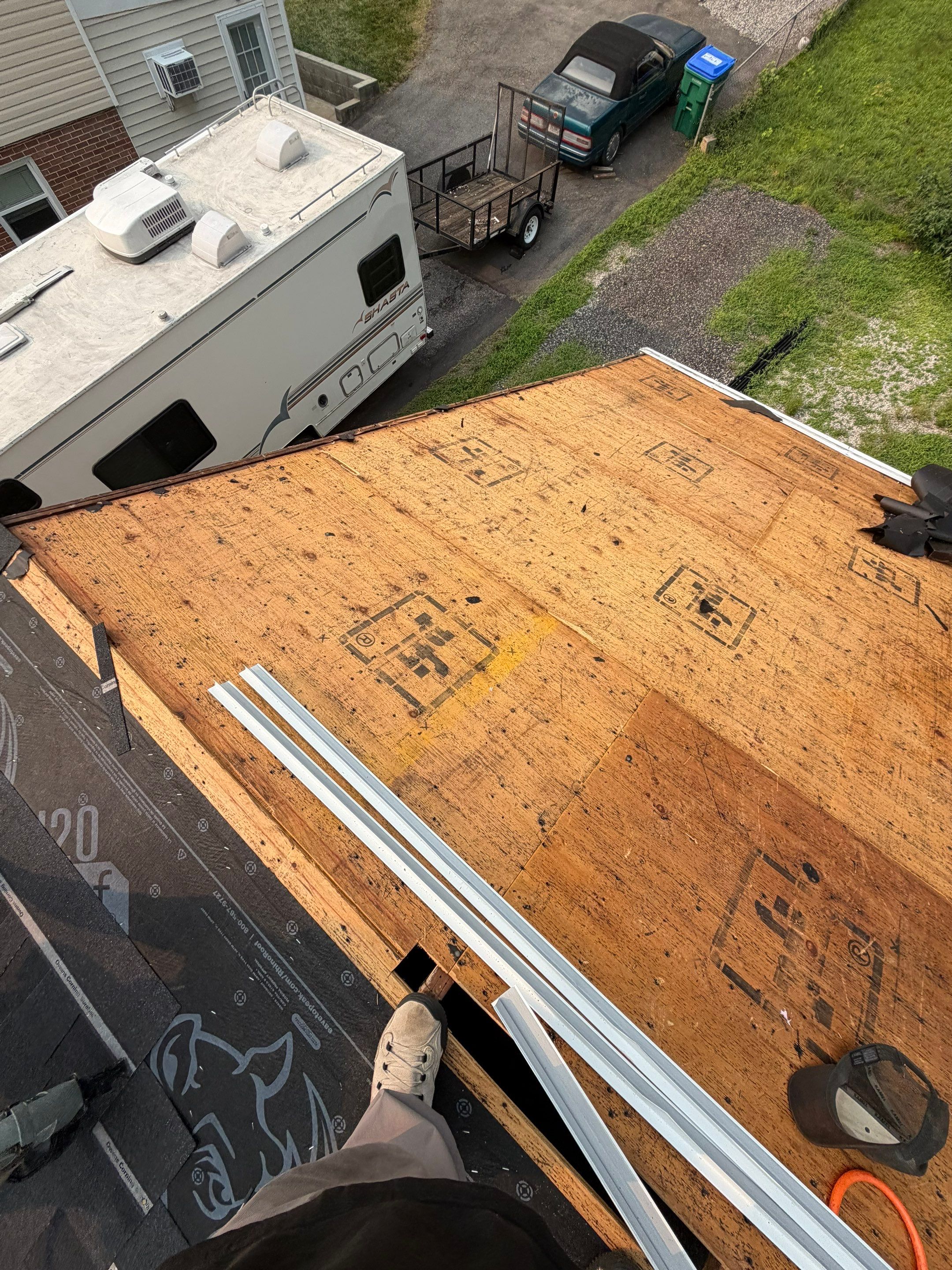 Asphalt Shingle Roof Replacement and Gutter Installation in Richmond by Cade Construction
