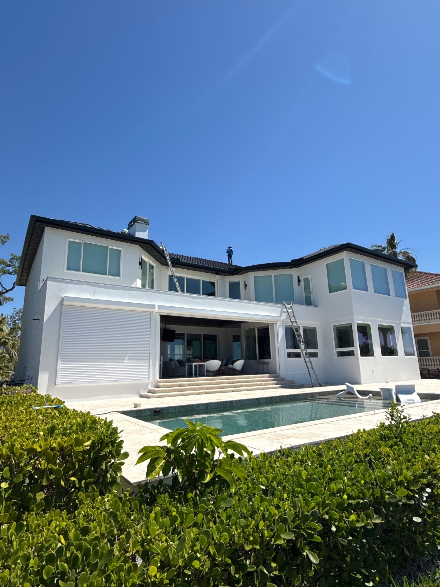 Soffit and Fascia Installation and black seamless gutters in Sarasota FL by Gutter Professors