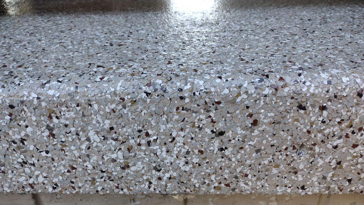 Pebble Beach Front Porch by Revival Concrete Coatings, LLC