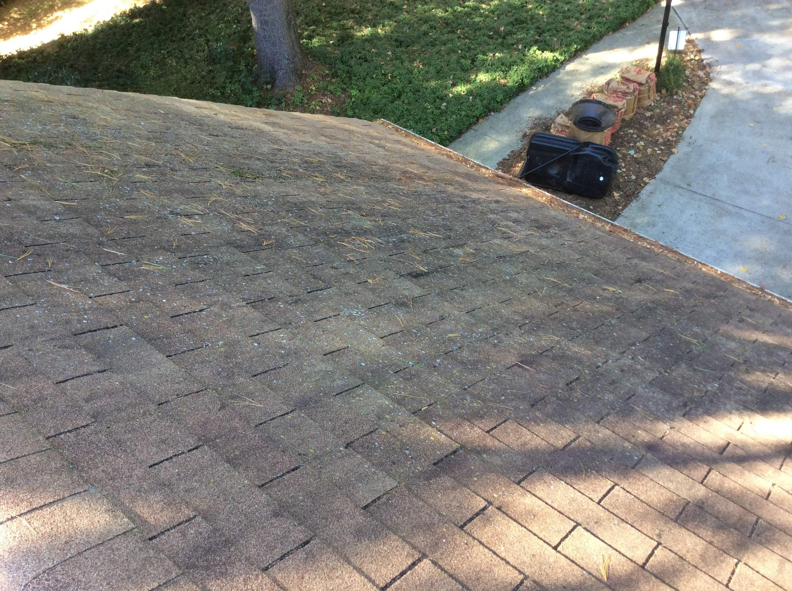 Residential Roofing Installation using Pewterwood Shingles  by Alpha Design Services