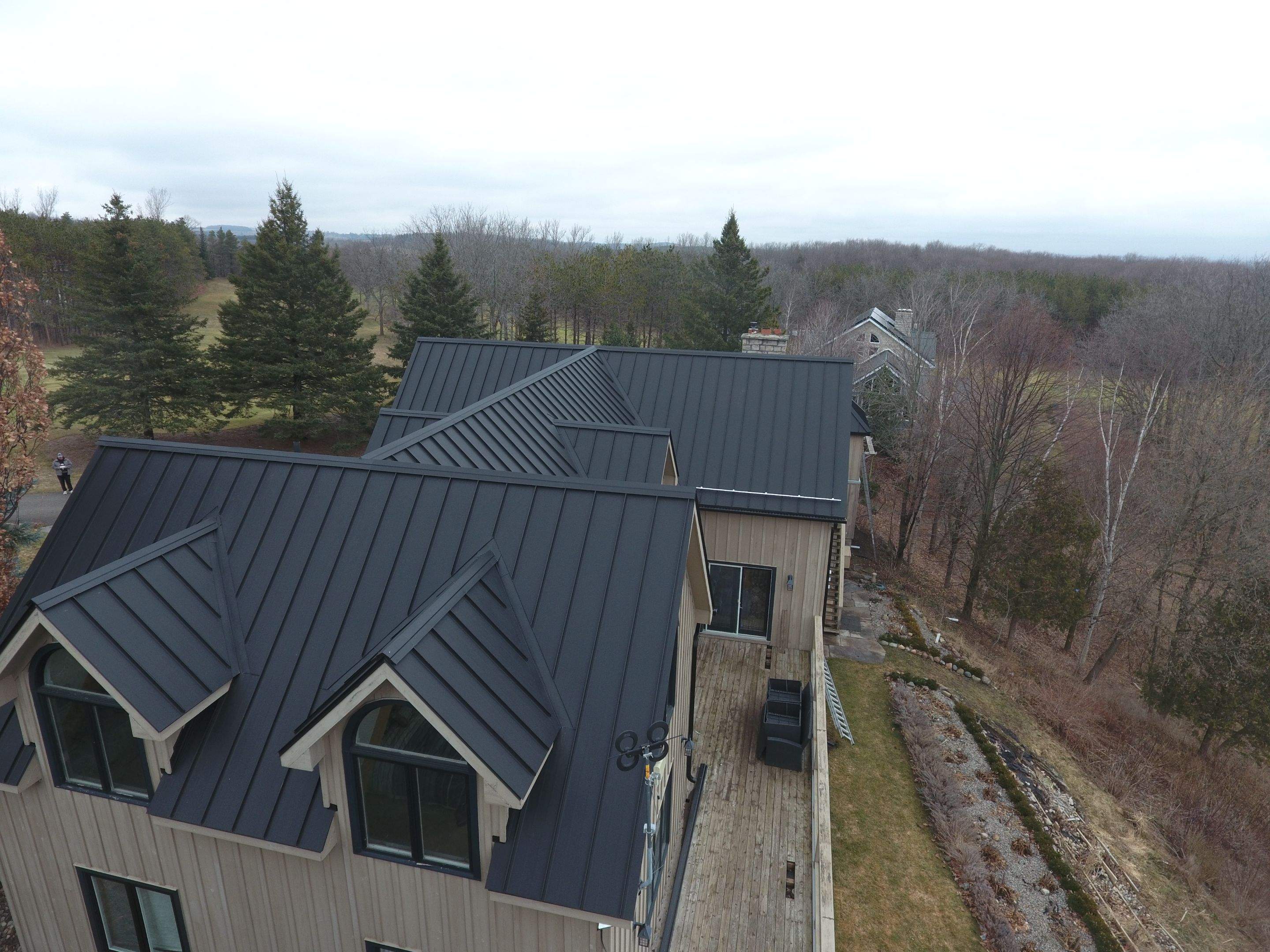Residential Roofing Installation using 24 Ga Standing Seam Metal by Jay Carter Roofing & Sheet Metal