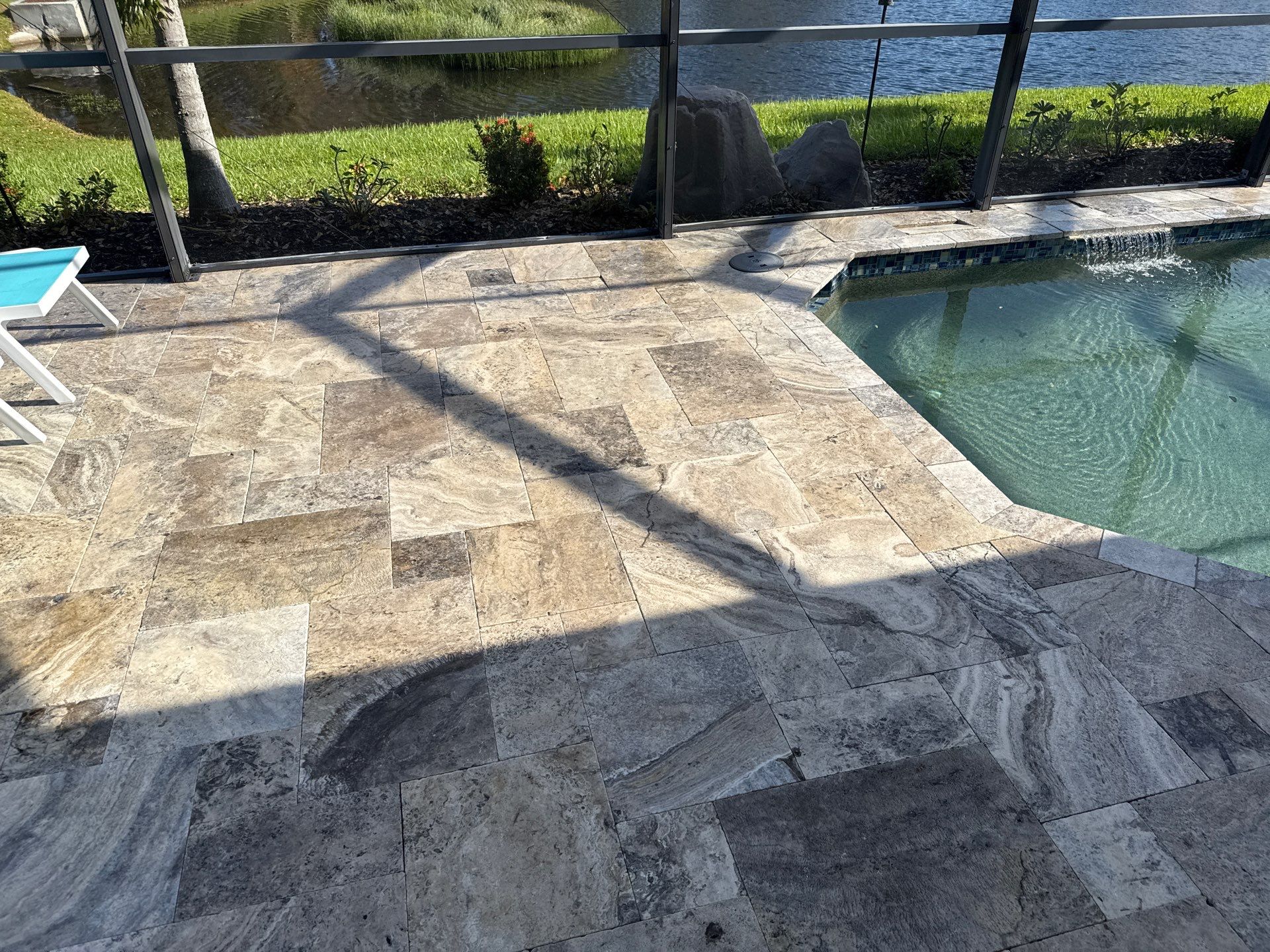 Travertine Pool Deck and Screen Enclosure Cleaning in Ellenton, FL | Oakleaf Hammock Community by Sunshine AquaWash