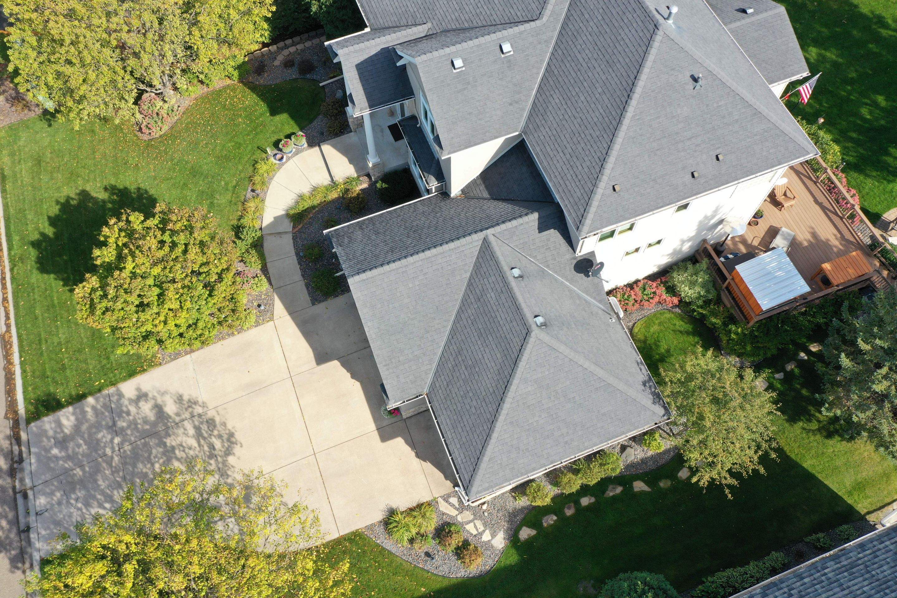 Residential Roofing Installation using Certainteed Landmark Moire Black by MODERN EXTERIOR SYSTEMS