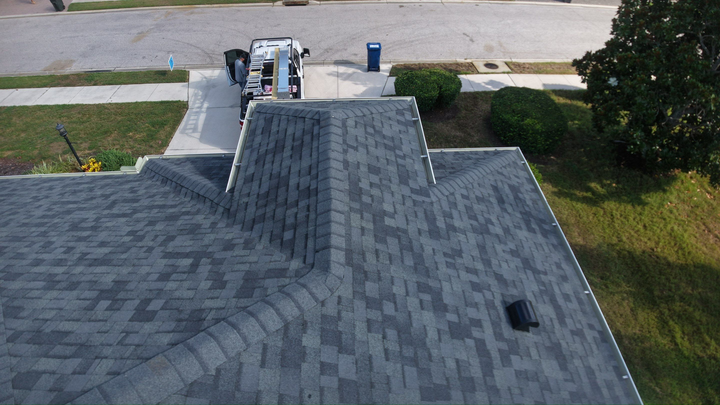 Residential Roof Installation With Estate Grey Architectural Shingles in Bradenton by Trinity Restoration and Roofing LLC