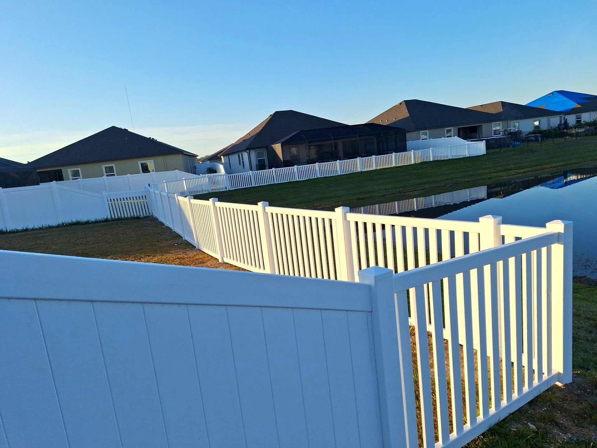 Vinyl Fence Installation using 6Ft White Vinyl Privacy Fence with a 4Ft White Clearwater Picket Fence by Asap fence and gates, LLC