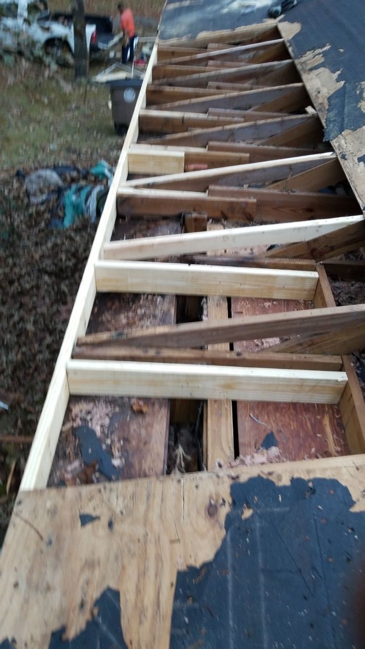 Residential Roofing Installation using Roof Replacement by American Roofing & Construction LLC