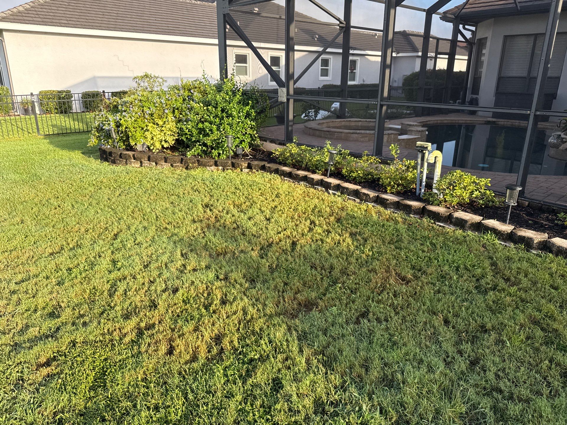 Tile Roof, Paver Pool Deck & Flowerbed Curbing Cleaning | Winding River Bradenton, FL Transformation by Sunshine AquaWash