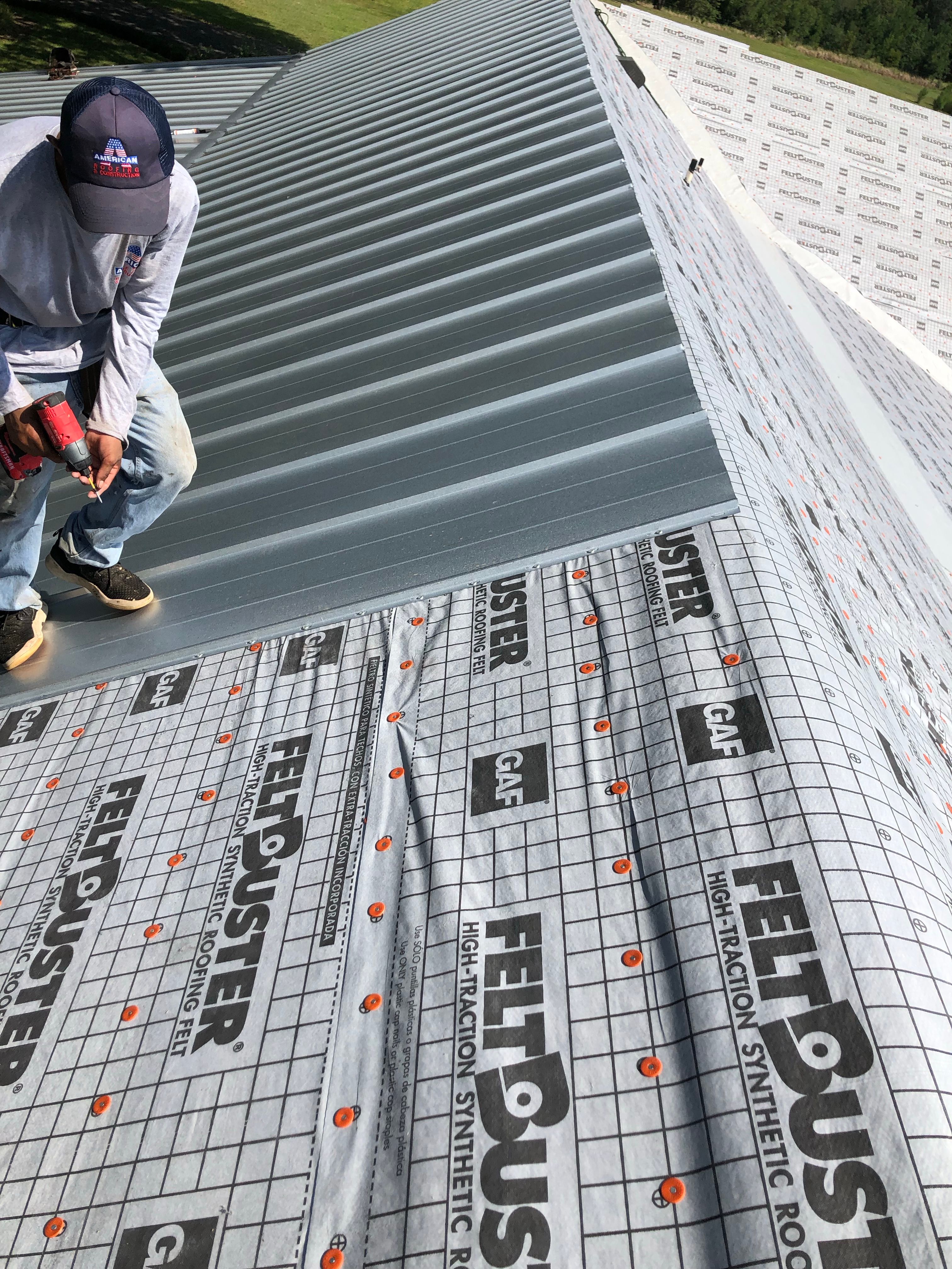 Residential Roofing Installation using Metal roofing by American Roofing & Construction LLC