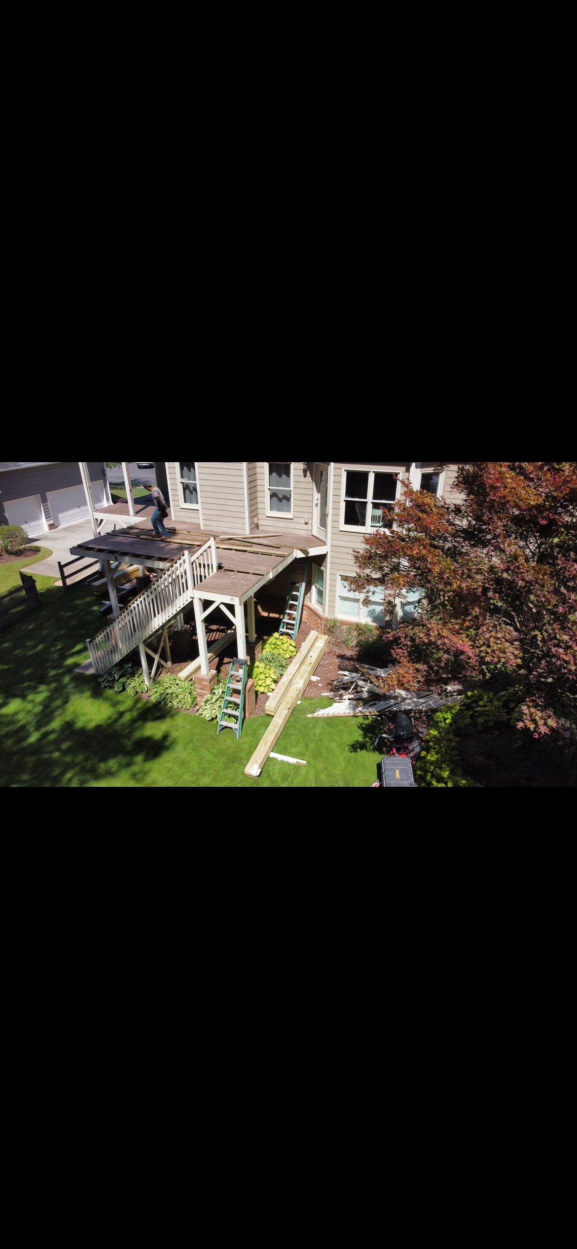 Multi-Level Composite Deck and Screened Porch in Acworth by Swift Home Renovations 