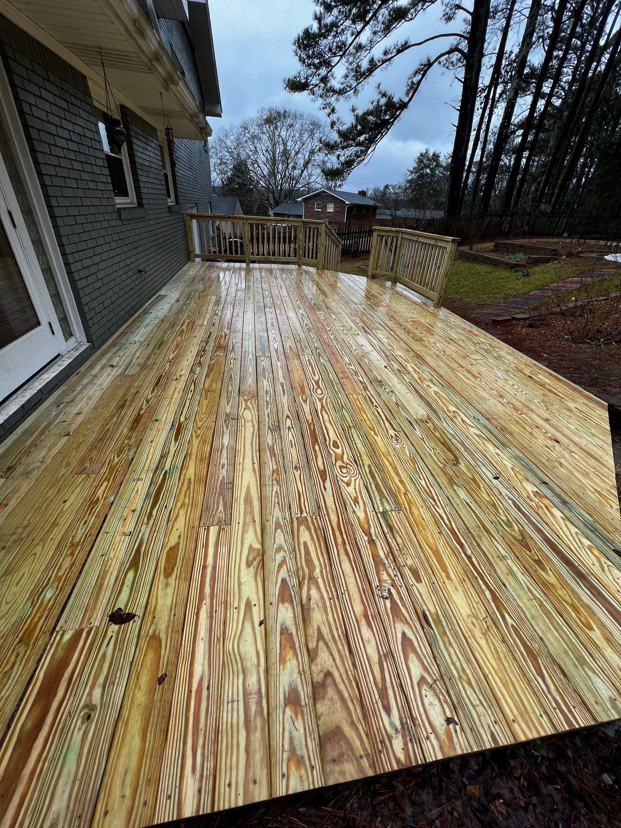Chamblee Deck Replacement with Pressure-Treated Lumber and New Stairs by Swift Home Renovations 