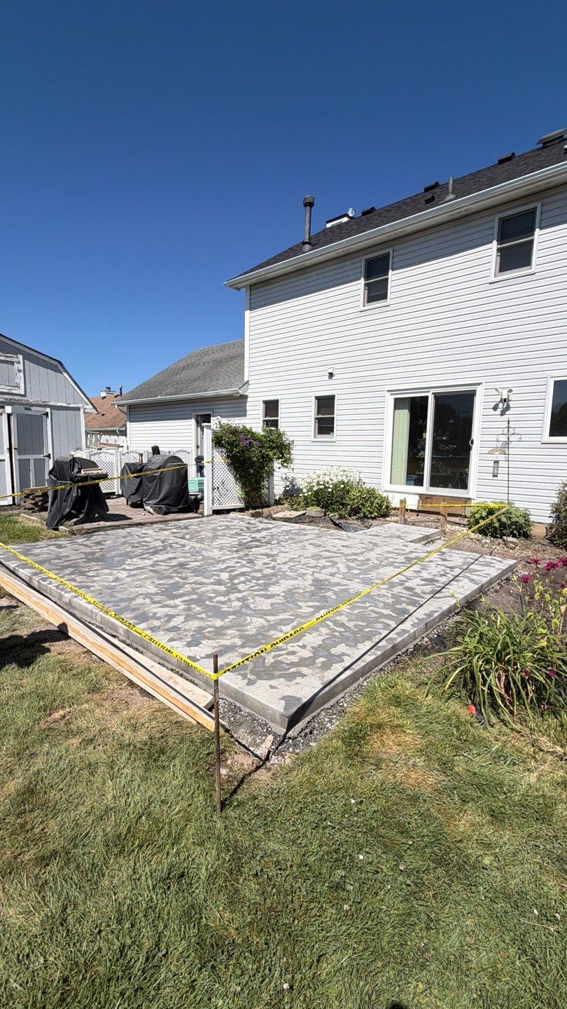 Henrietta Oxford Slate Patio by NG Masonry & Construction LLC