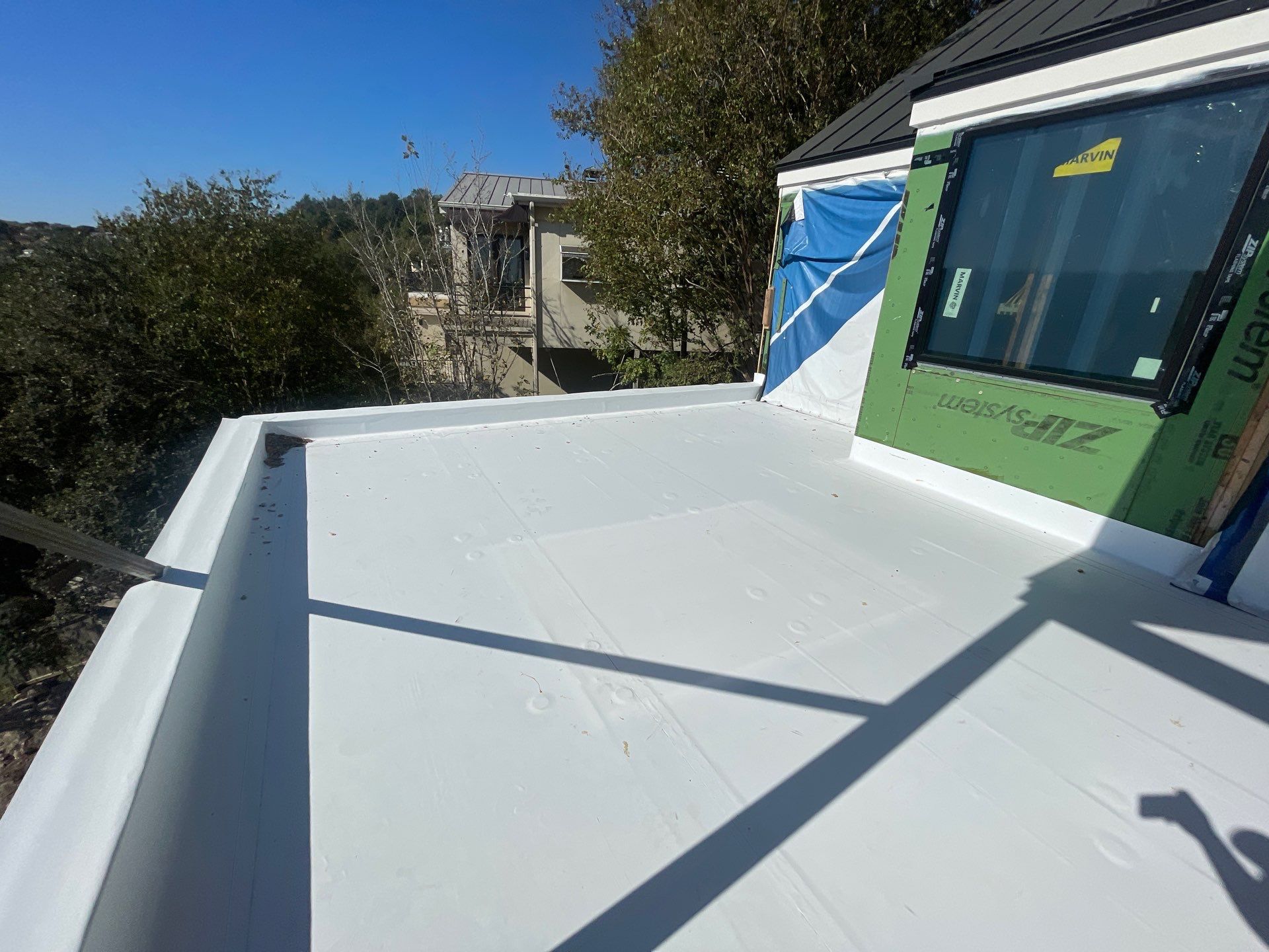 Metal and TPO Roof System by Cool Roofs