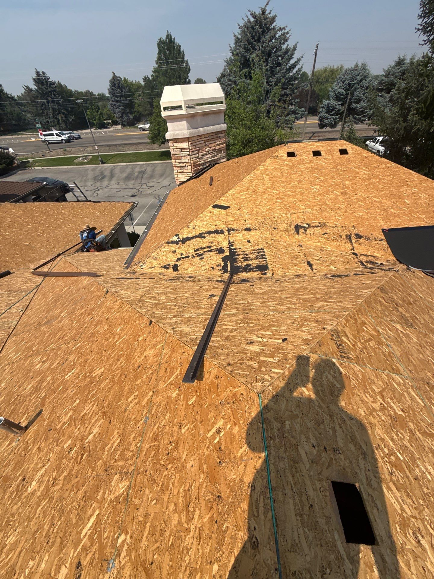 Boise Commercial Roof Replacement with Brown Architectural Shingles by Olive Roofing