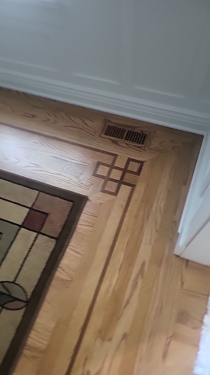 Ann Arbor Elegance: Red Oak and Walnut Living Room Masterpiece by Ann Arbor Hardwoods