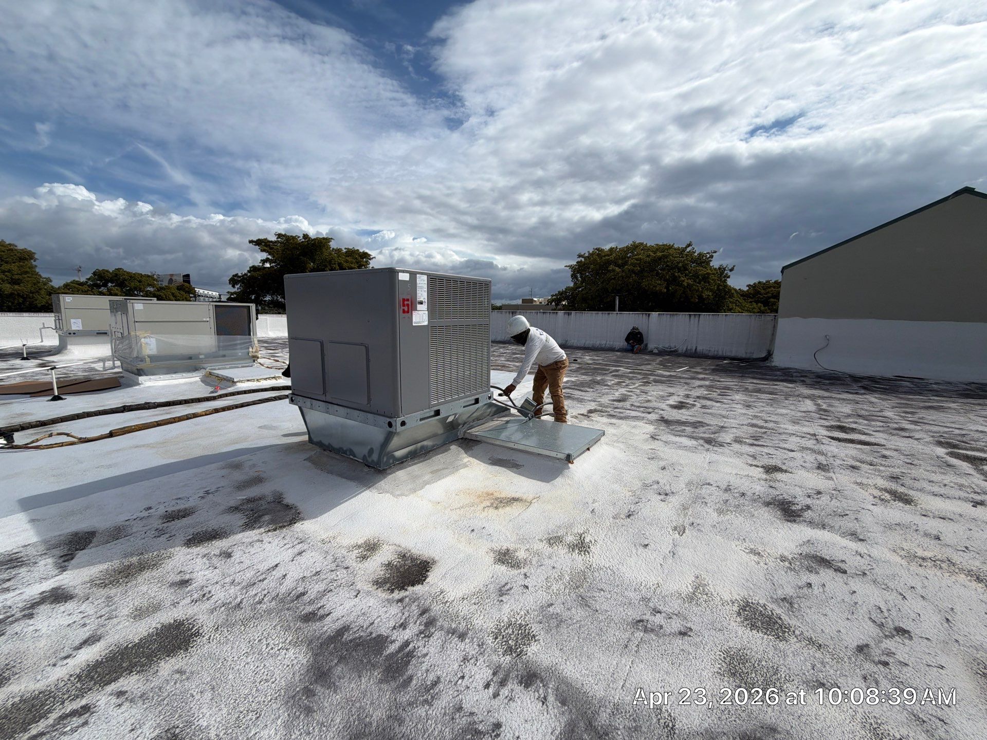 Commercial Flat Roof Restoration and Elastomeric Waterproofing in Delray Beach by Roof King LLC