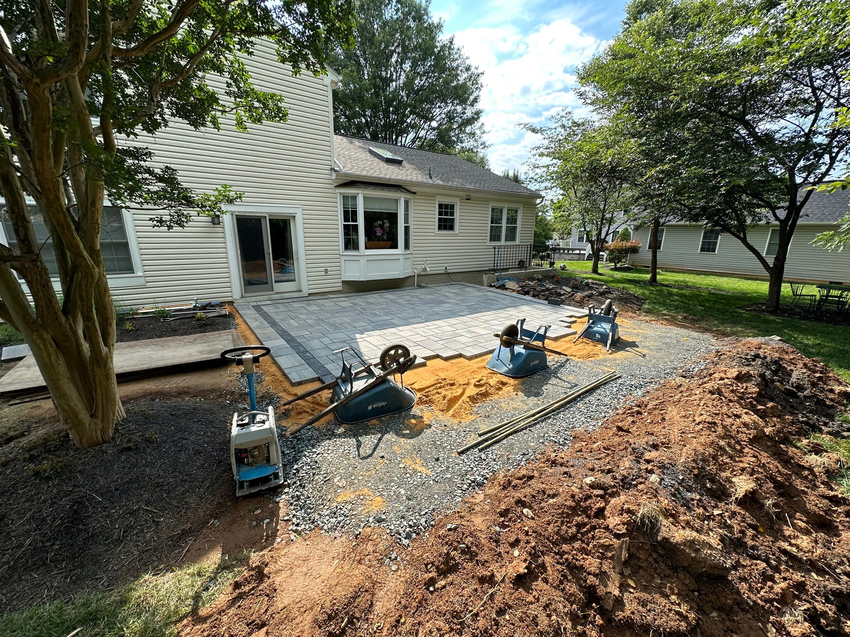 Backyard Transformation using Techo-Bloc Pavers by The Smet Companies, LLC