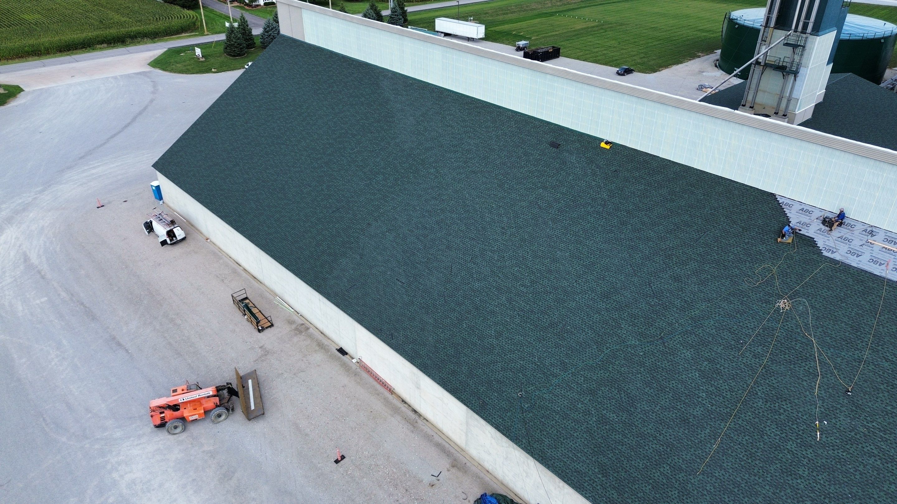 Commercial Roofing Installation using Timberline HDZ Shingles - Hunter Green by RoofX 