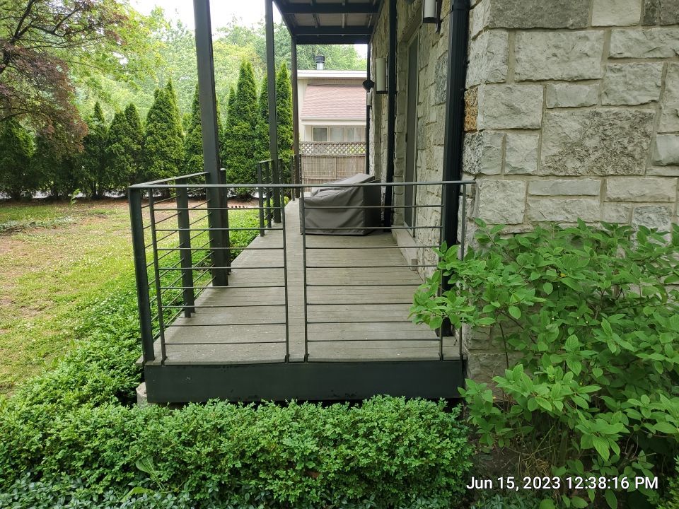 Highland Park, IL Bluestone, concrete,  Trex deck cleaning by Northern Power Washing LLC.