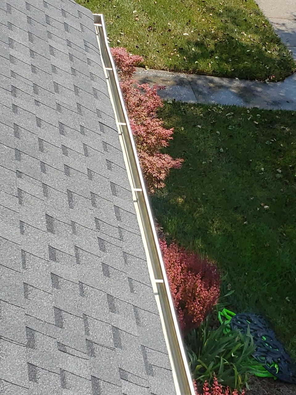 Gutter Cleaning using water by Power Wash Masters LLC