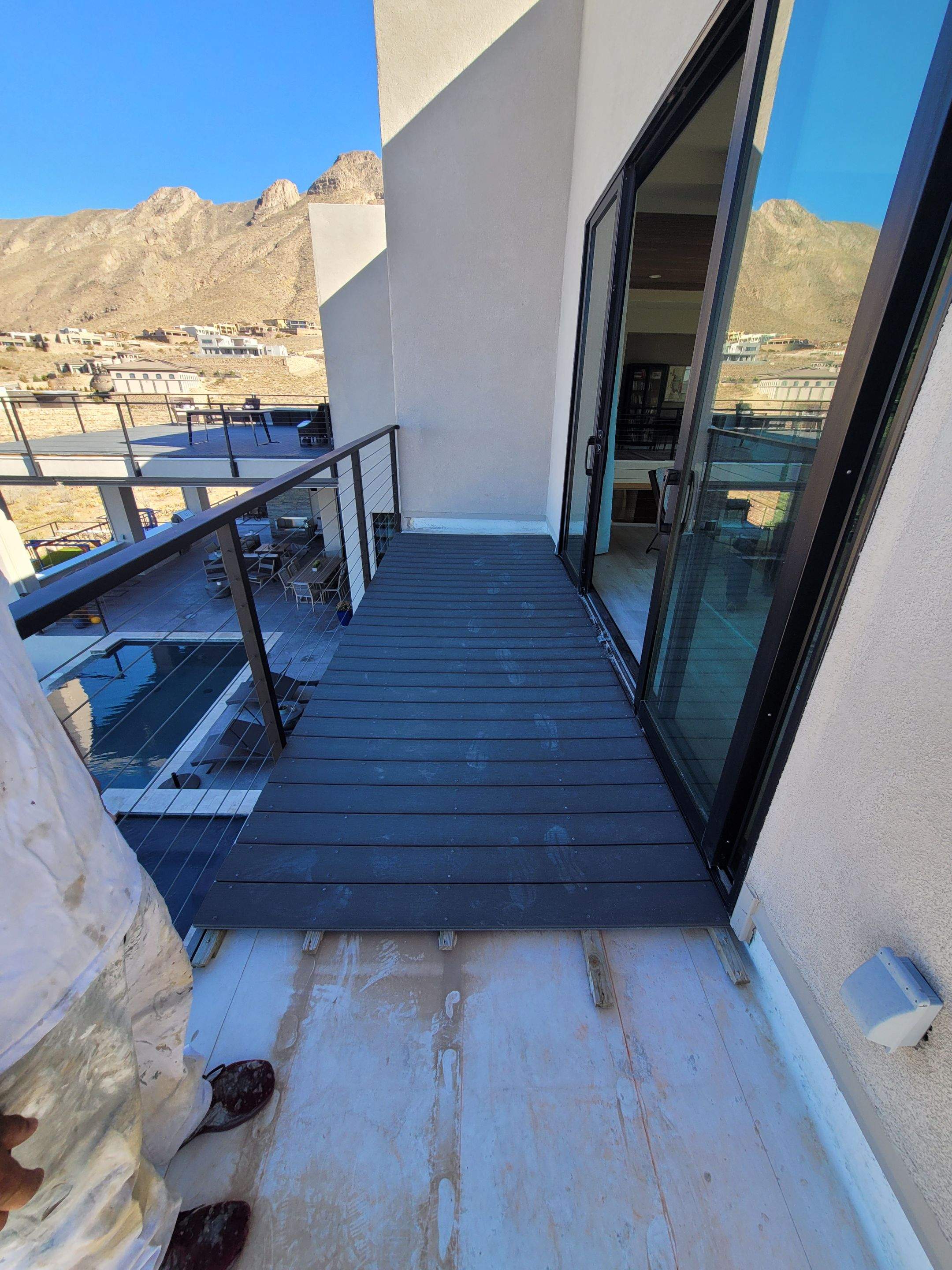 Exterior Wood Staining and Composite Decking Installation by Regal Renovate
