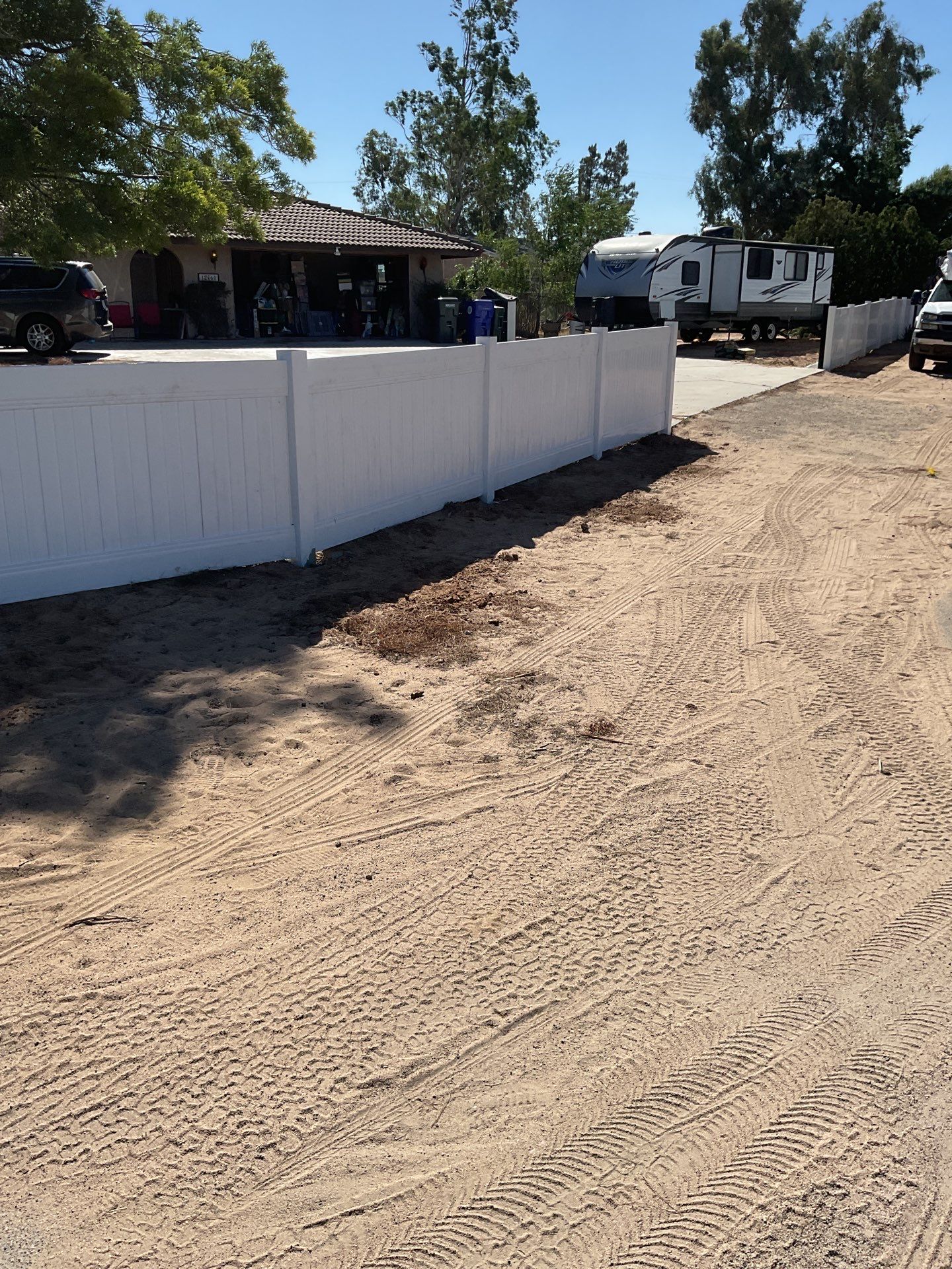 4ft White Vinyl Fence with Solar Power Motorized Gate by Fence Guys Inc.