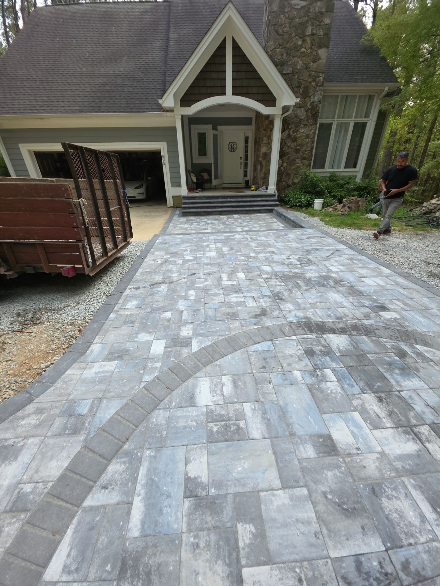Pittsboro Outdoor Living Transformation – Retaining Wall, Paver Patio & Elevated Deck by Elite Remodeling and Design LLC