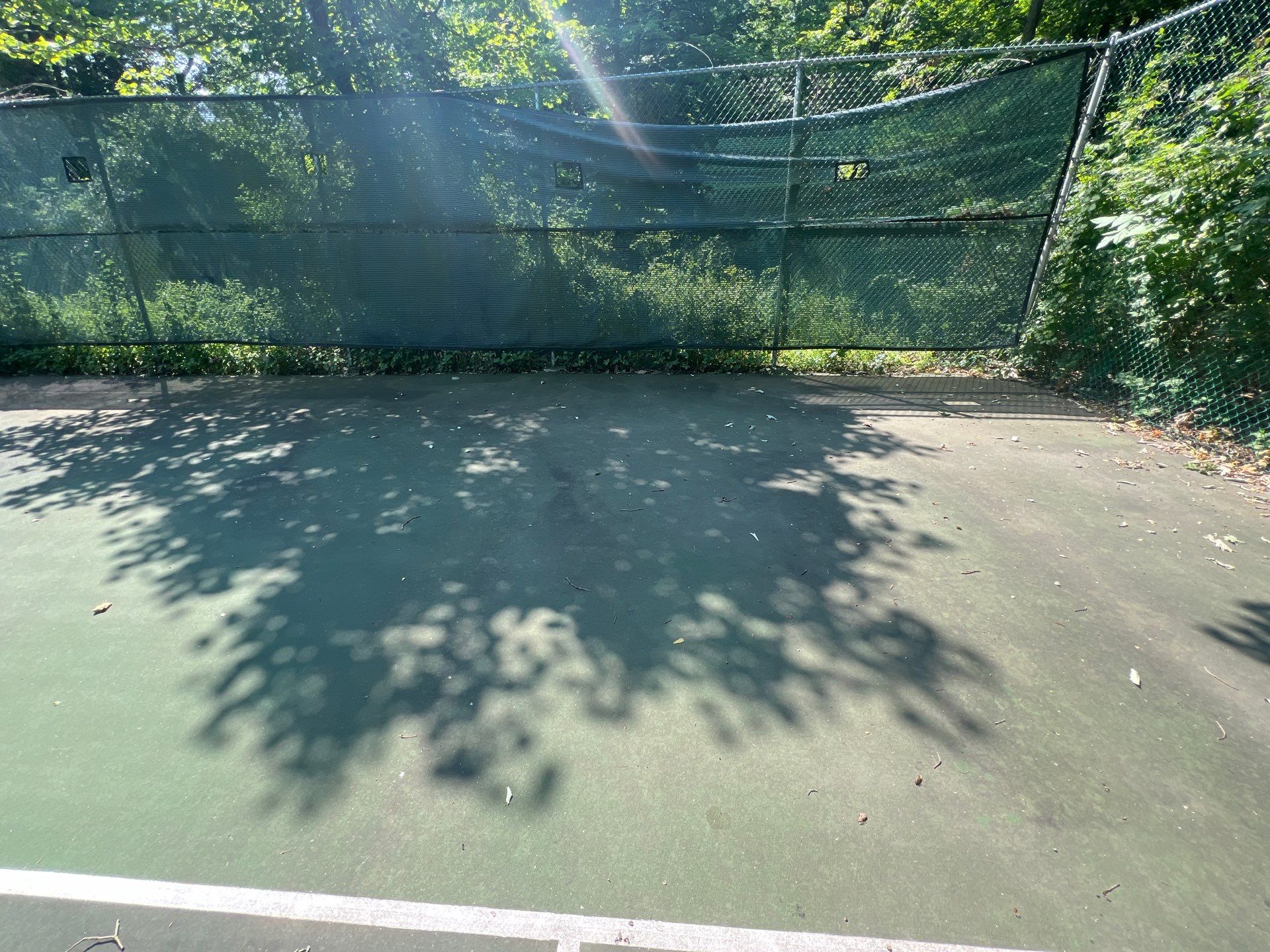 Deck, Patio, and Tennis Court Cleaning by Northern Power Washing LLC.