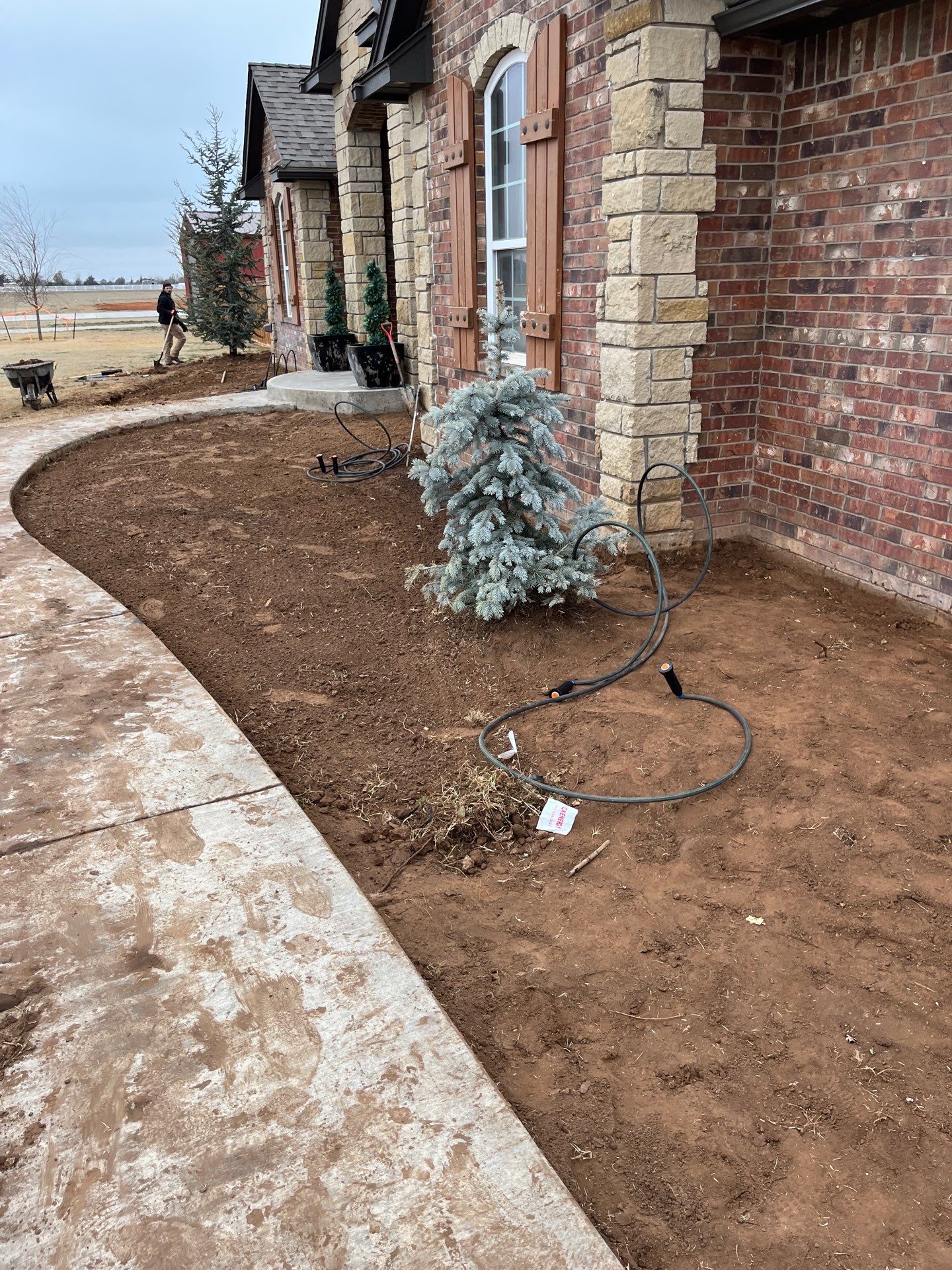 Landscape installation w/ irrigation and landscape lighting by Clays Services Inc