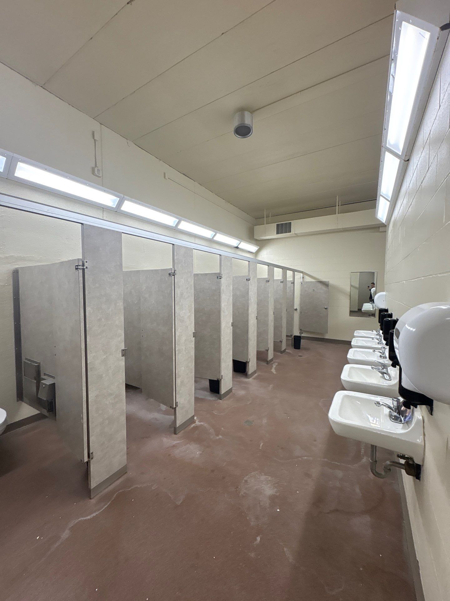 Commercial Restroom Interior Painting and Facility Updates in Sioux Falls by Select Painting, Coatings & Garage Cabinets