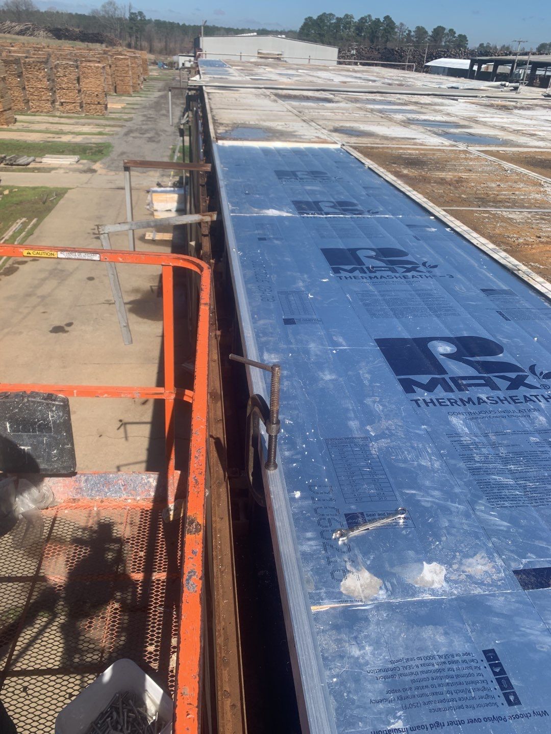 Commercial Roofing Installation using Aluminum Roofing panels by Hostetler Roofing