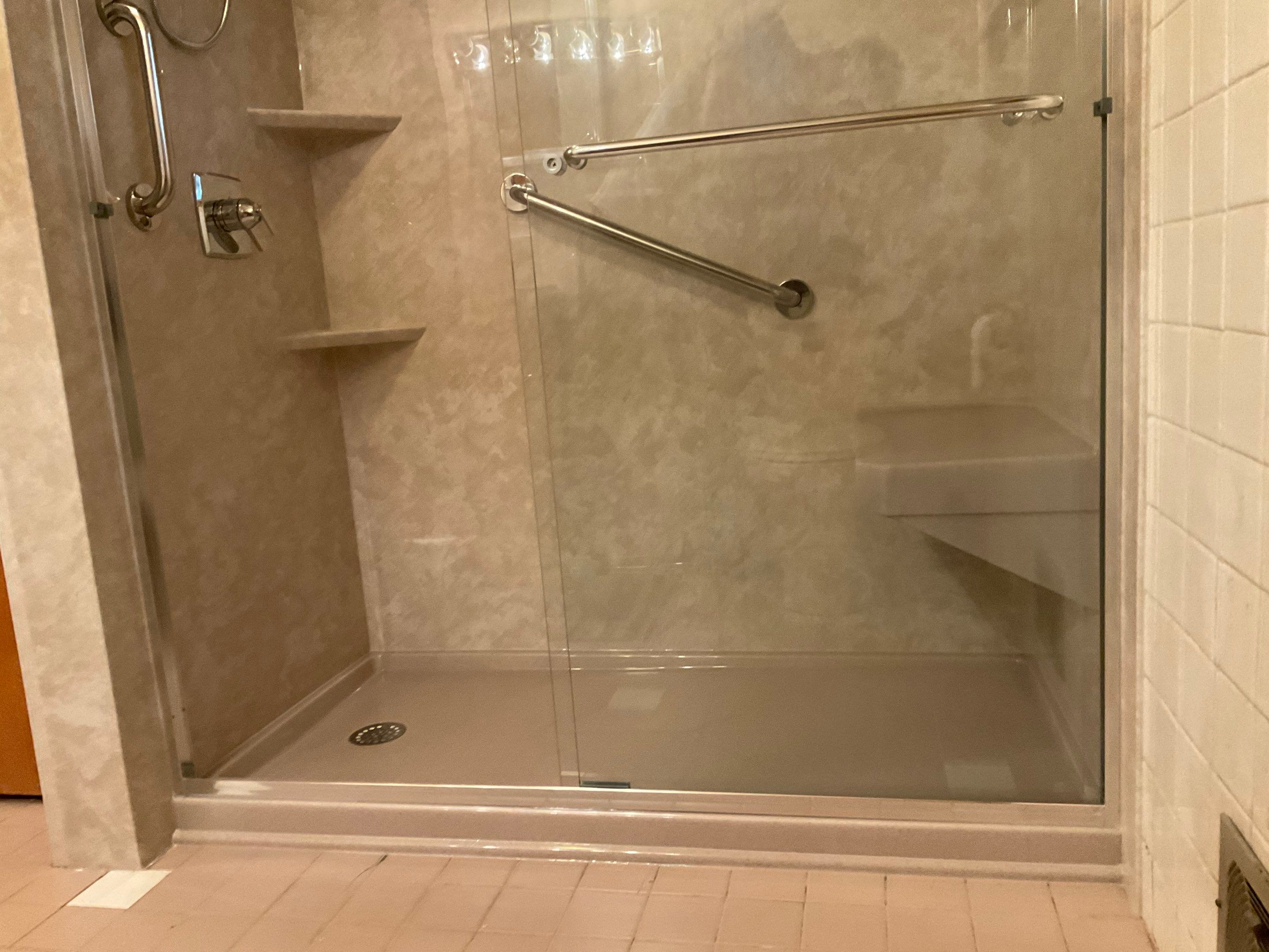 Tub to Shower Conversion: White Travertine by Rome Bath Remodeling