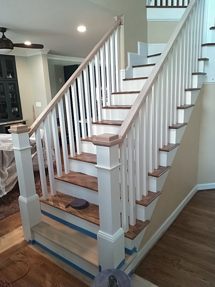 Stairway Installation using Red oak modern railings by House Custom Carpentry, LLC