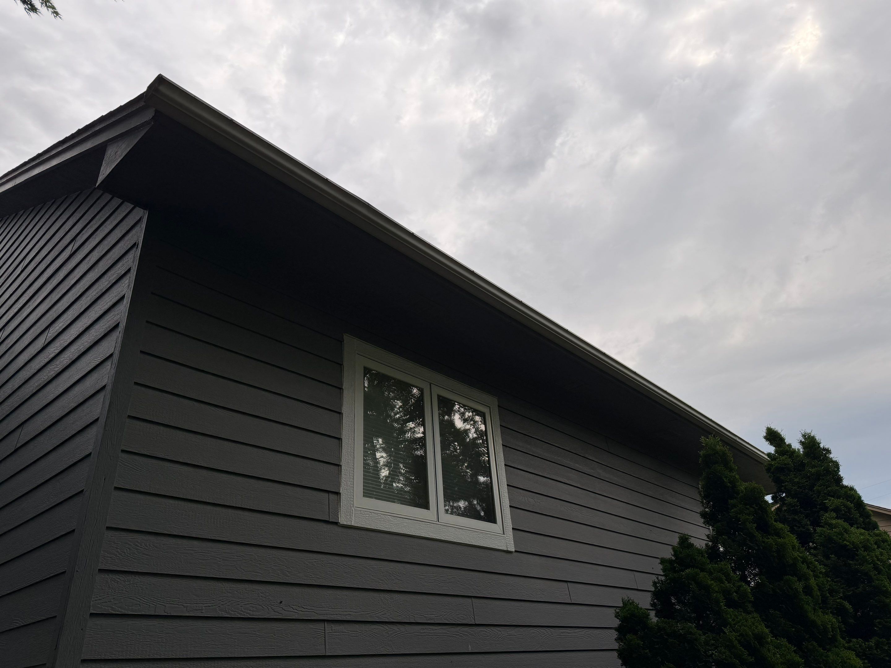 Full Exterior Painting for Gray Siding and Trim in Sioux Falls by Select Painting, Coatings & Garage Cabinets