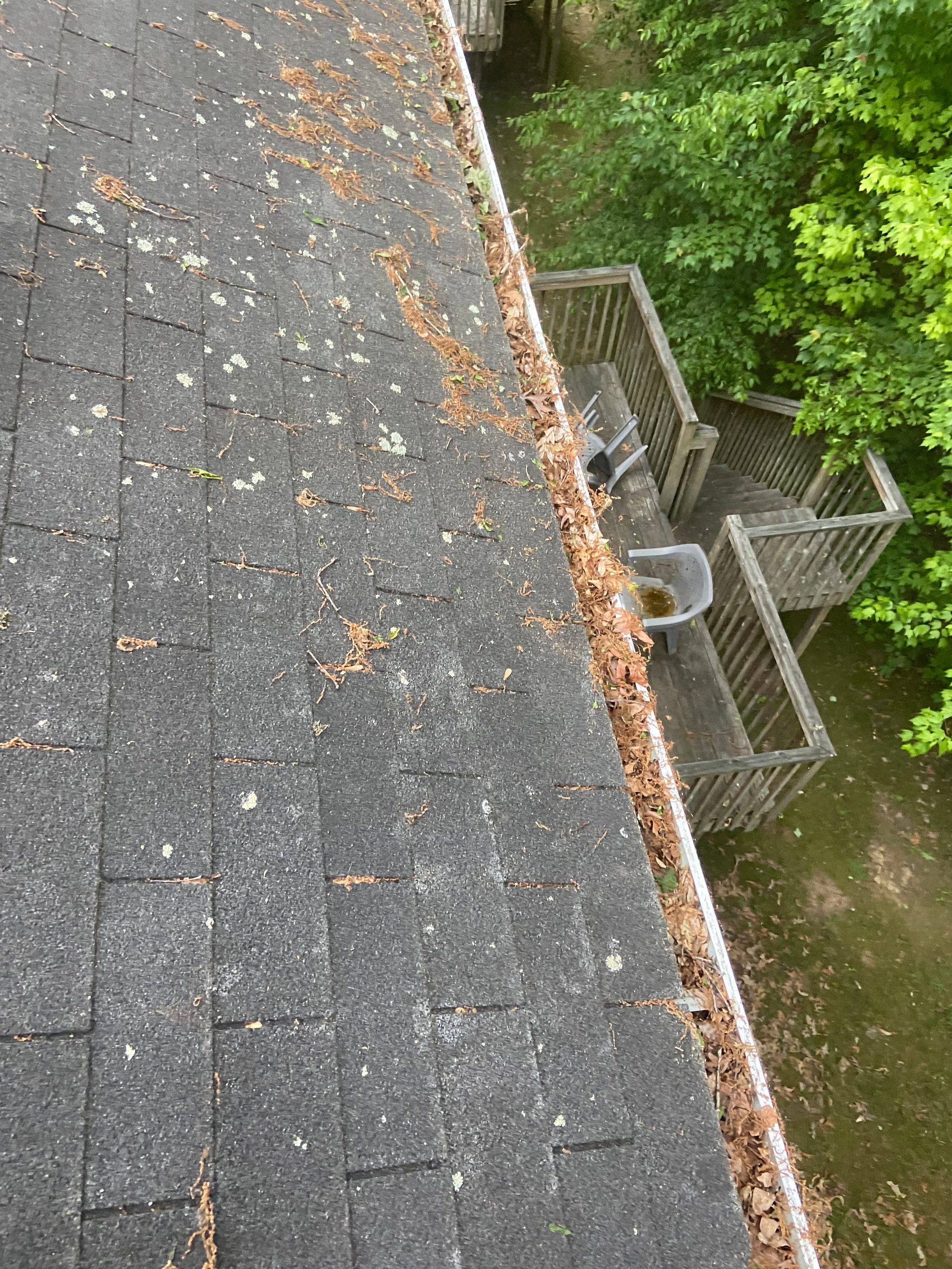 Commercial gutter cleaning Pennsylvania before photo with filled gutters