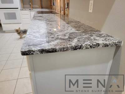 Kitchen countertops using White Normandy Granite