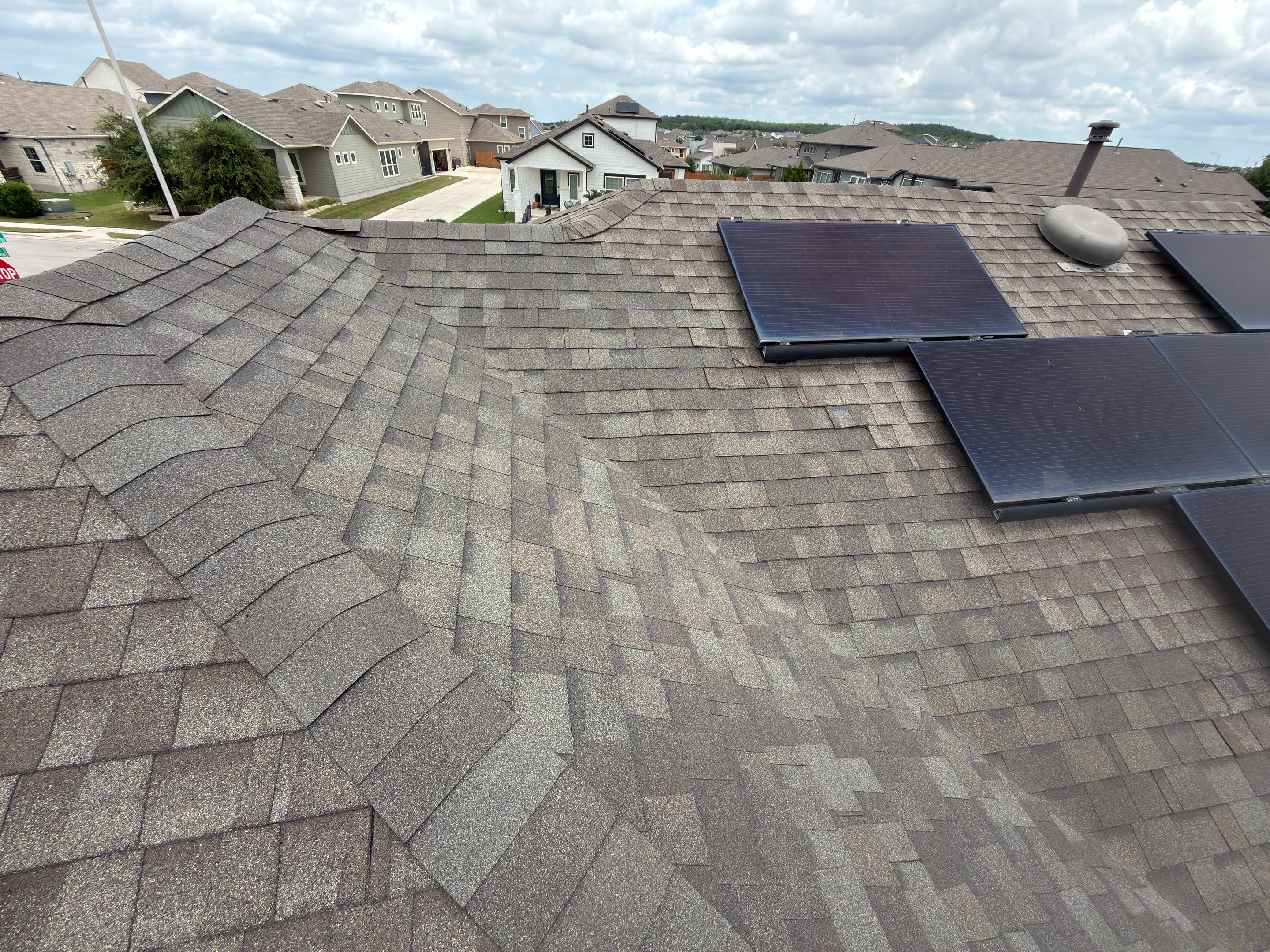 Roof Replacement with Solar Re-Install in Southeast Austin by Skywall Construction LLC