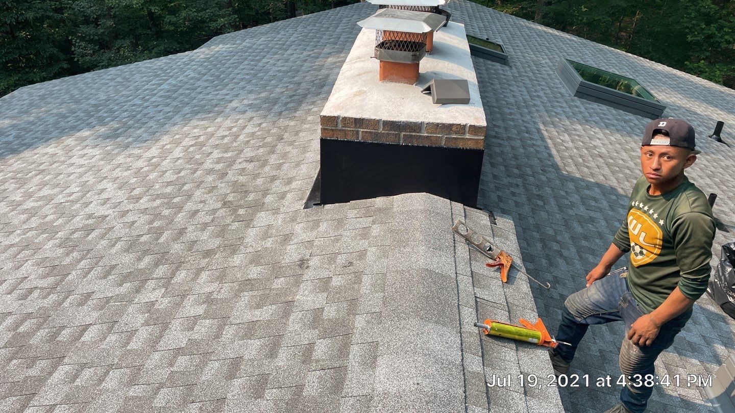 Deckhouse Roof Replacement by American Home Contractors