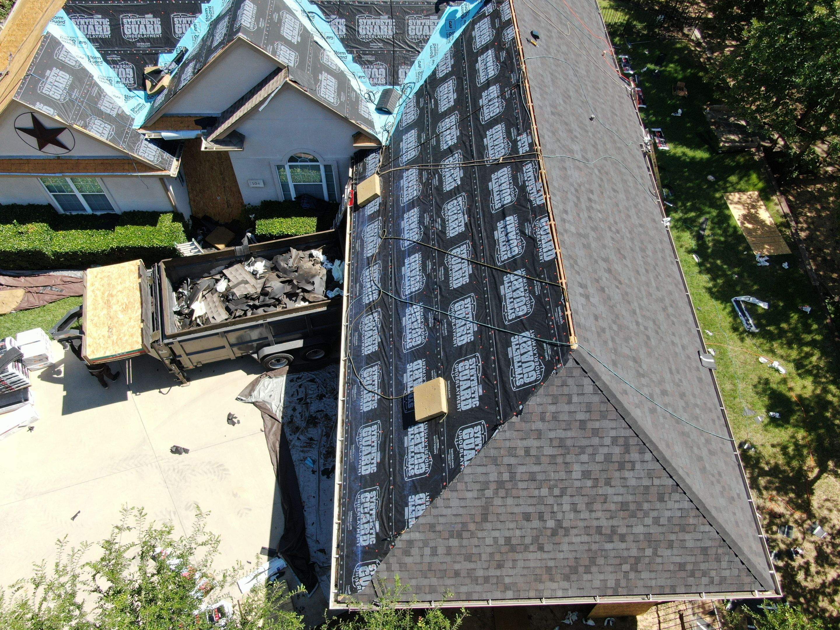 Residential Roof Replacement Using Tamko Titan Shingles in Runaway Bay by Armor Roofing | Exteriors