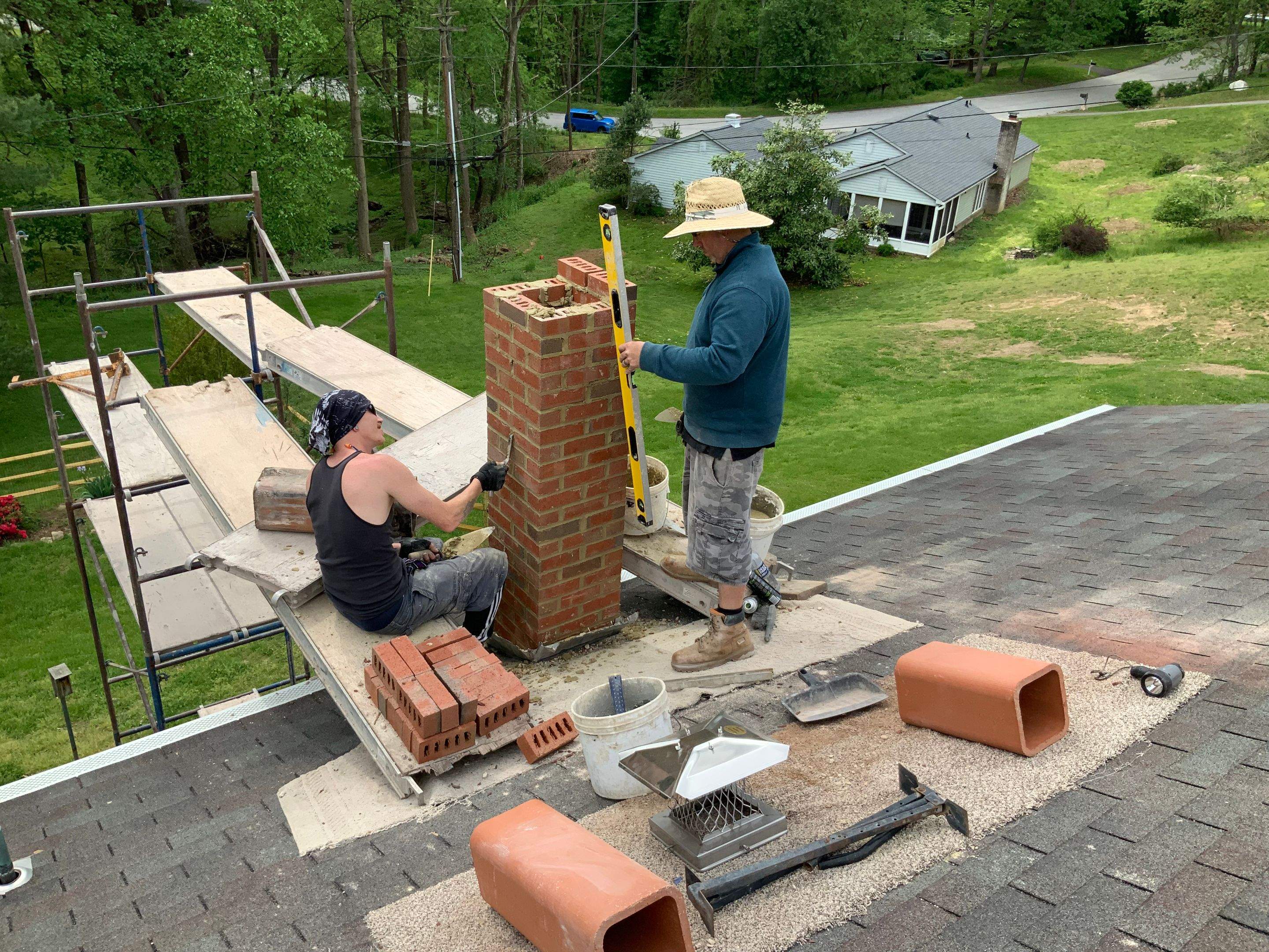 Residential Roofing Installation using Landmark Shingles Color Weatherwood by Alpha Design Services