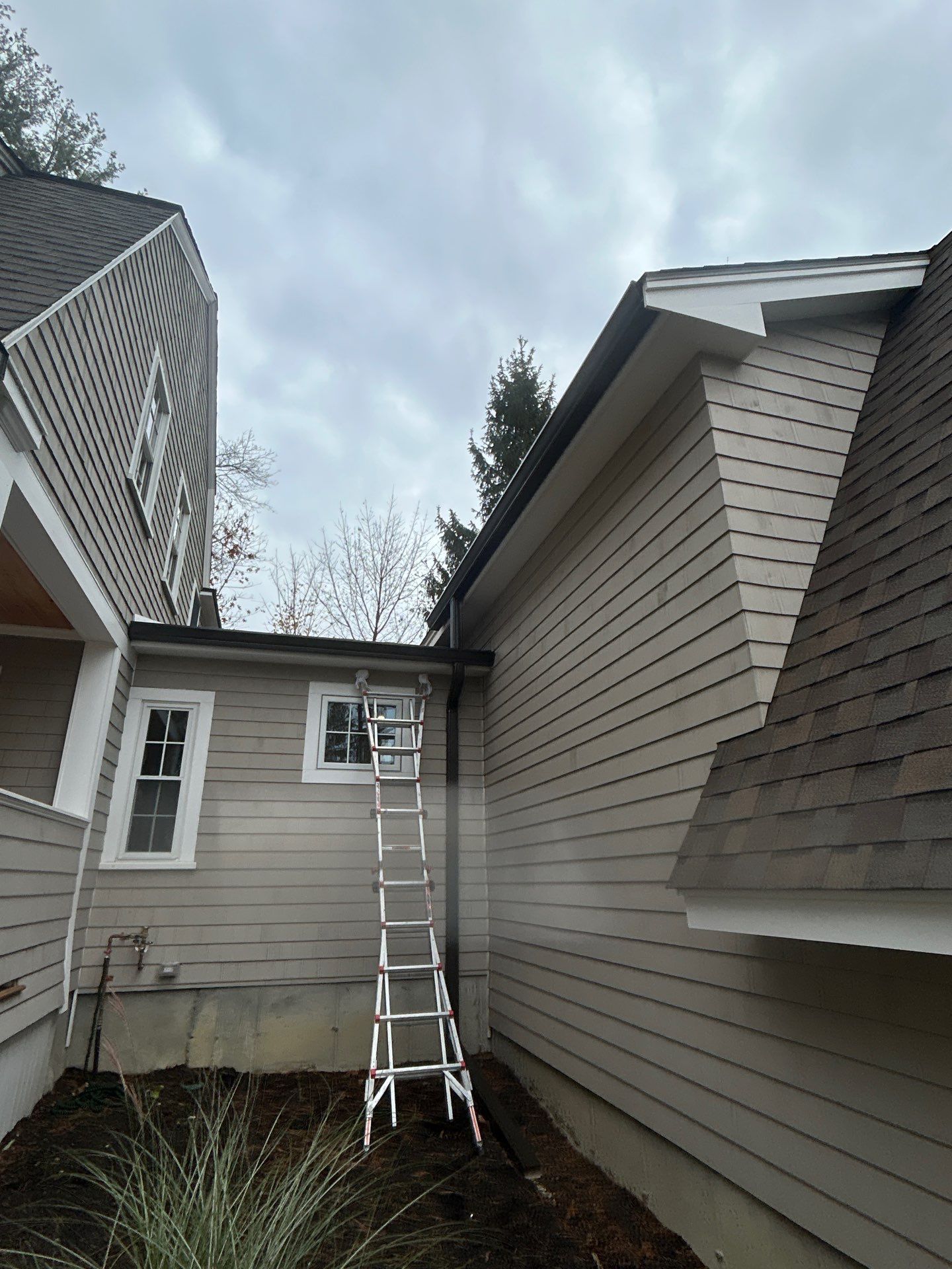 Andover Complete Gutter System with T-Rex Guards & Valley Splashguard by Mighty Dog Roofing of Greater Middlesex County