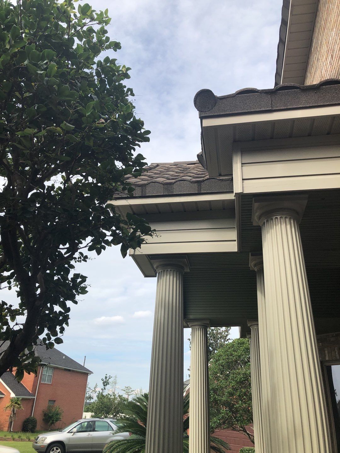 Seamless Gutter Installation with Wicker Color K-Style Gutters and LeafBlaster Pro Mesh Gutter Guards by Gutter Professors