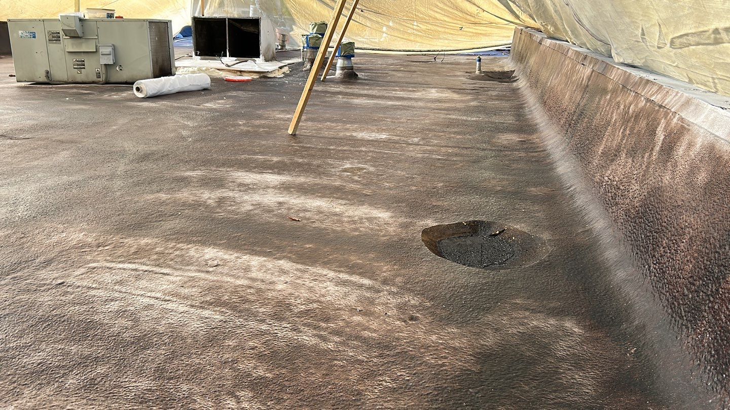 Foam Refurbish using Conklin Benchmark/PUMA XL coatings and spray foam; Also metal roofing around parapet wall by Straight Edge Roofing Inc