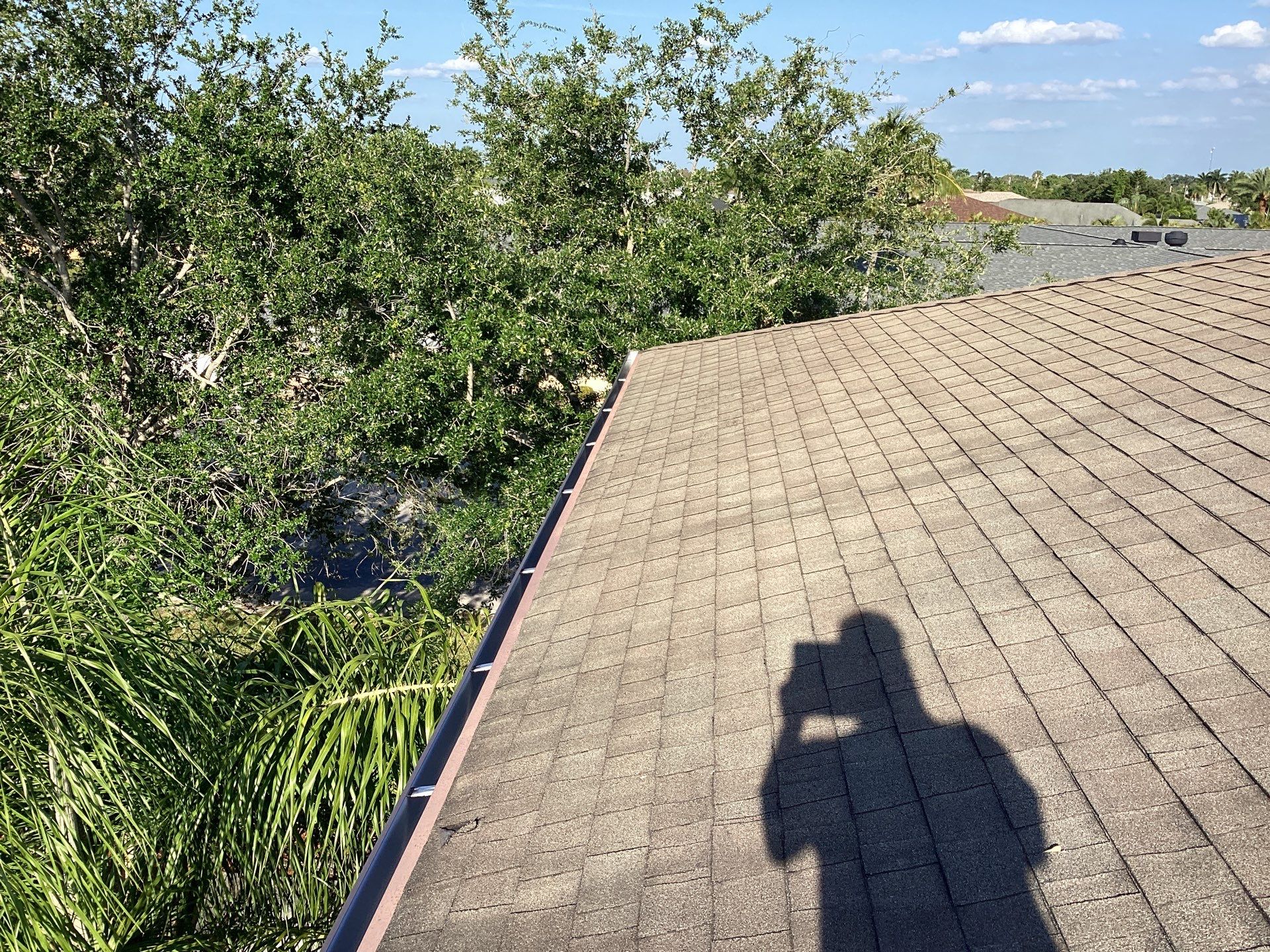 Musket Brown Seamless Gutters using Musket Brown Seamless Gutters in Capen Coral FL by Gutter Professors