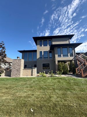 Exterior Painting and Siding Refresh for Multi-Level Tea Residence