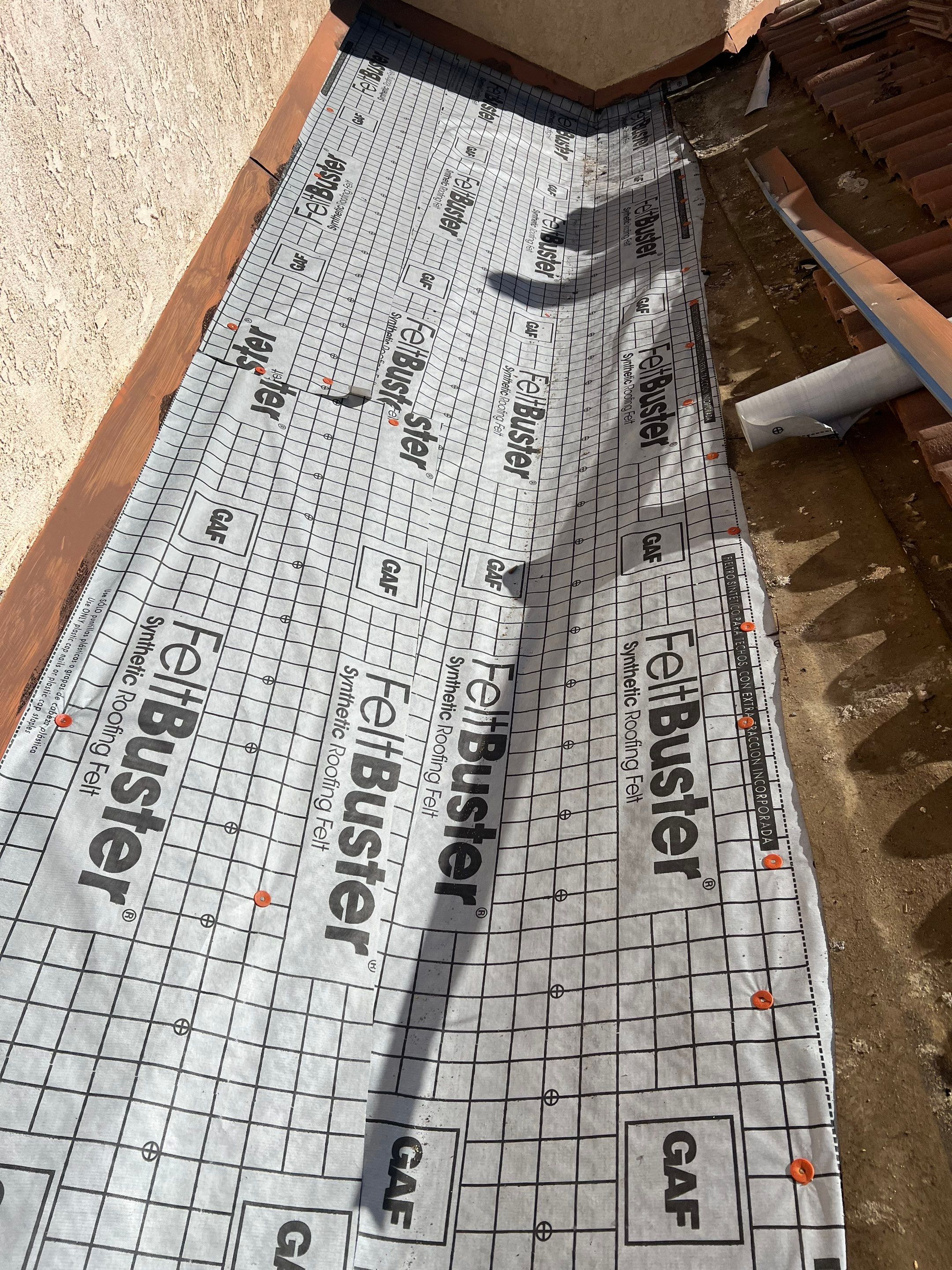 Tile Roof repair by Grandmark Service Company