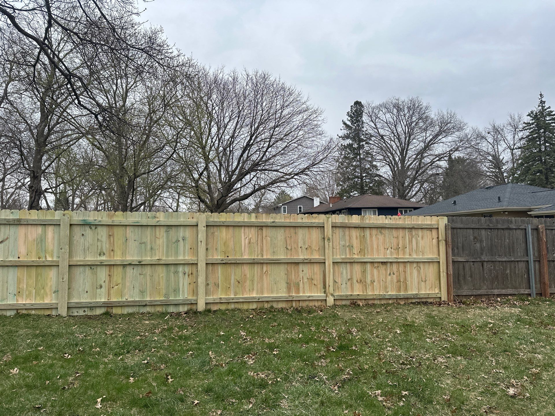Pressure-Treated Wood Privacy Fence Replacement in Waterloo by Perfect Picket Fence and Stain