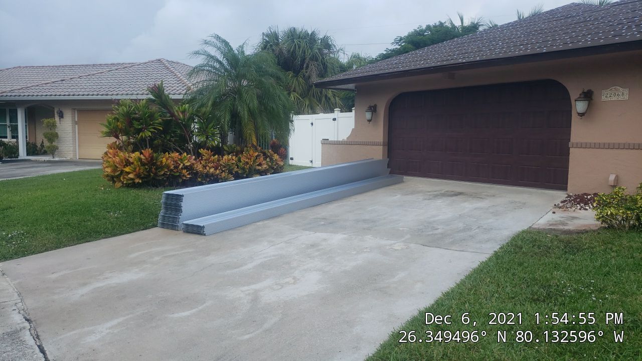 Residential Roofing Installation using 1" Nail strip metal roof by BLUES BROTHERS ROOFING