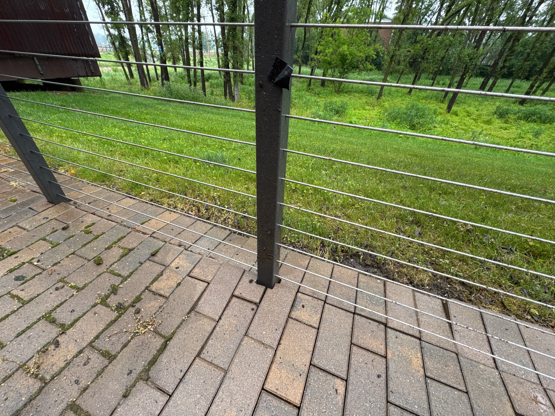 Brick paver repair, cleaning, sealing and poly sanding by Northern Power Washing LLC.