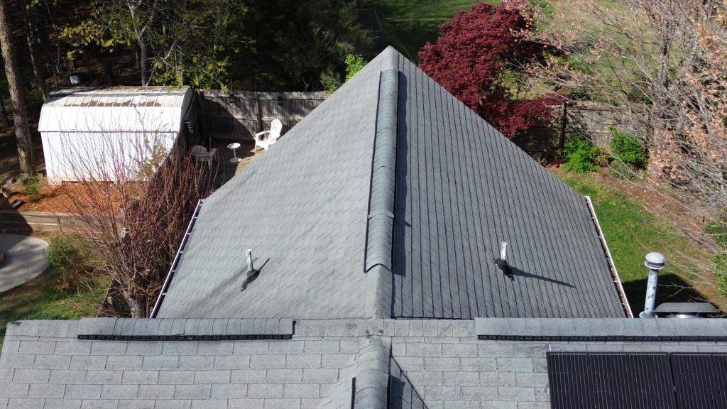 Roof and downspout replacement by hail and wind damage by Just Brilliant Restoration JBR